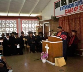 Dr. Ron speaking at graduation